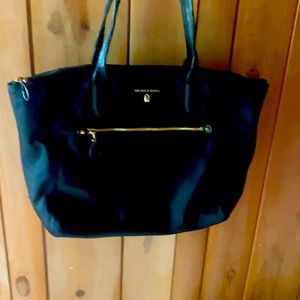 Michael Kors wear on handles body excellent